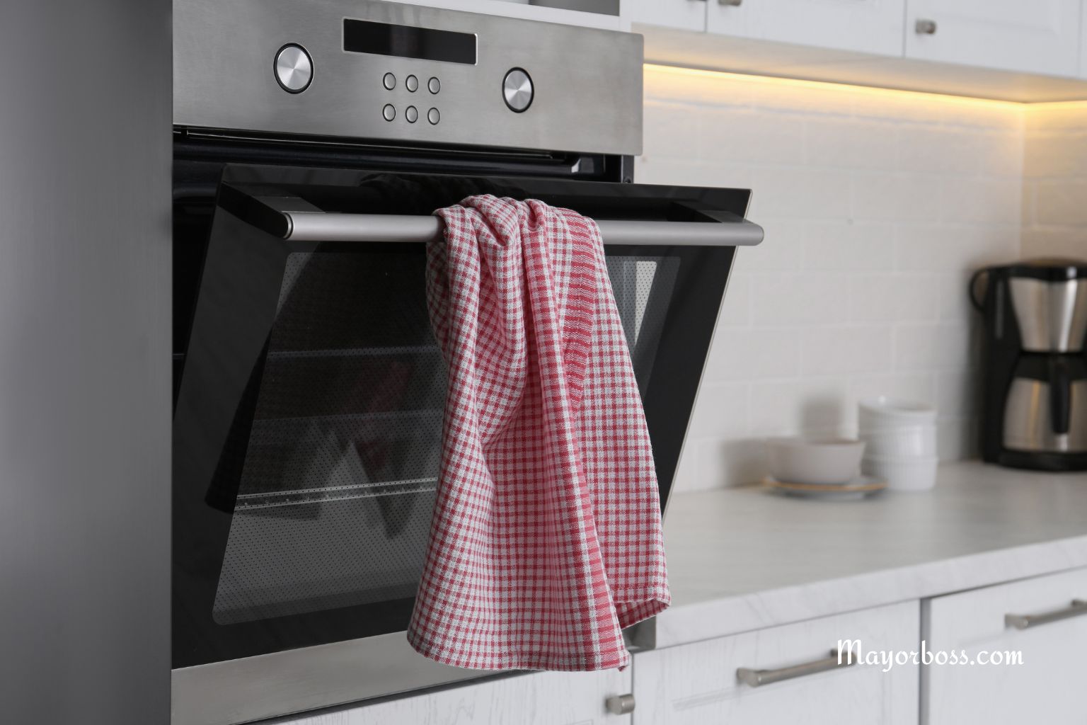 Why You Shouldn’t Hang Kitchen Towels on the Oven Door