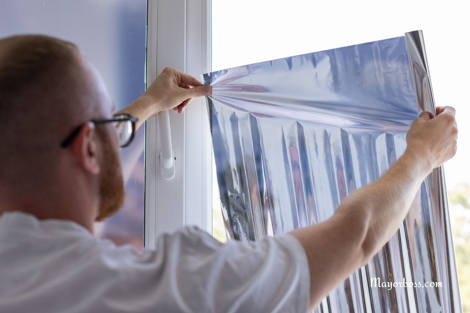 Households urged to put kitchen foil in windows as soon as possible to stay cool in the heatwave